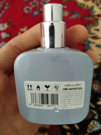 عطر جیبی مردانه اسکلاره مدل CRD Aventus حجم 35 میلی لیتر به همراه عطر جیبی مردانه مدل Silver Scent