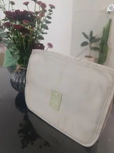 تجریه خرید کیف لوازم آرایش زنانه مدل ضد آب طرح تراول بگ