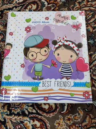 آلبوم عکس کودک مدل چسبی طرح دختر و پسر