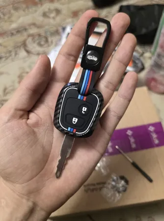 کاور ریموت و سوئیچ خودرو ام آر جی مدل A1074طرح فلز کربن مناسب برای پژو 207