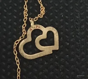 تجریه خرید گوشواره طلا 18 عیار زنانه طرح قلب کد EL-004