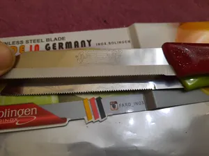 تجریه خرید چاقو زولینگن مدل اره ای کد MA001