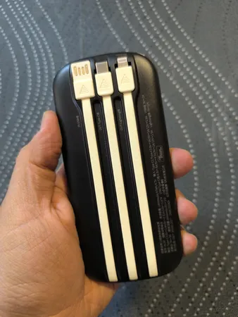 پاوربانک 22.5 وات نیوماین مدل AL28 ظرفیت 10000 میلی آمپر ساعت