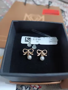 تجریه خرید گوشواره میخی طلا 18 عیار زنانه ماوی گالری مدل پاپیون ریز و مروارید