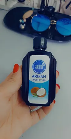 روغن نارگیل آرمان مدل Pure Oil حجم 60 میلی لیتر