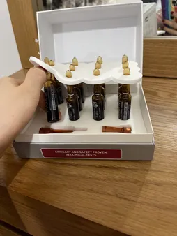 سرم ضد ریزش مو بیوتا مدل بیوکسین حجم 8 میلی لیتر بسته 12 عددی