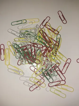 گیره کاغذ رایدین مدل رنگی سایز 28-33میلی متر - بسته 100 عددی