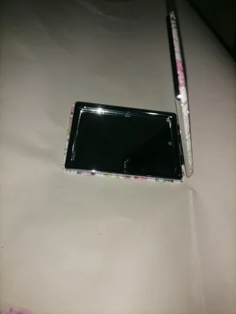 آینه جیبی مدل ذره بینی