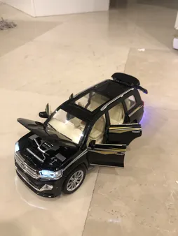 ماشین بازی چه ژی مدل فلزی 6 درب بازشو تویوتا دودزا