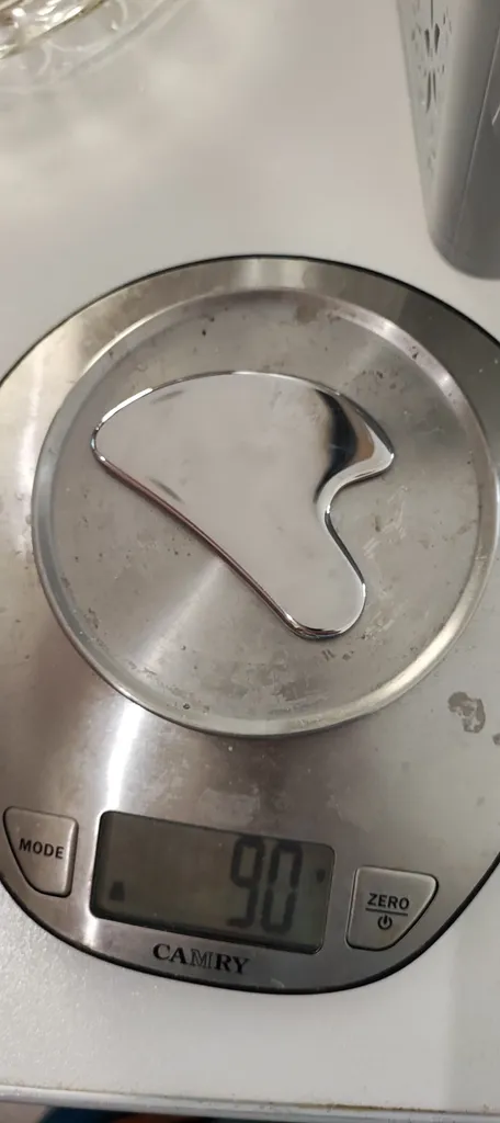 ماساژور دستی صورت مدل گوآشا استیل