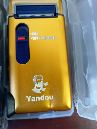 ماشین اصلاح موی صورت یاندو مدل Sv-w301u به همراه تیغه و توری یدک