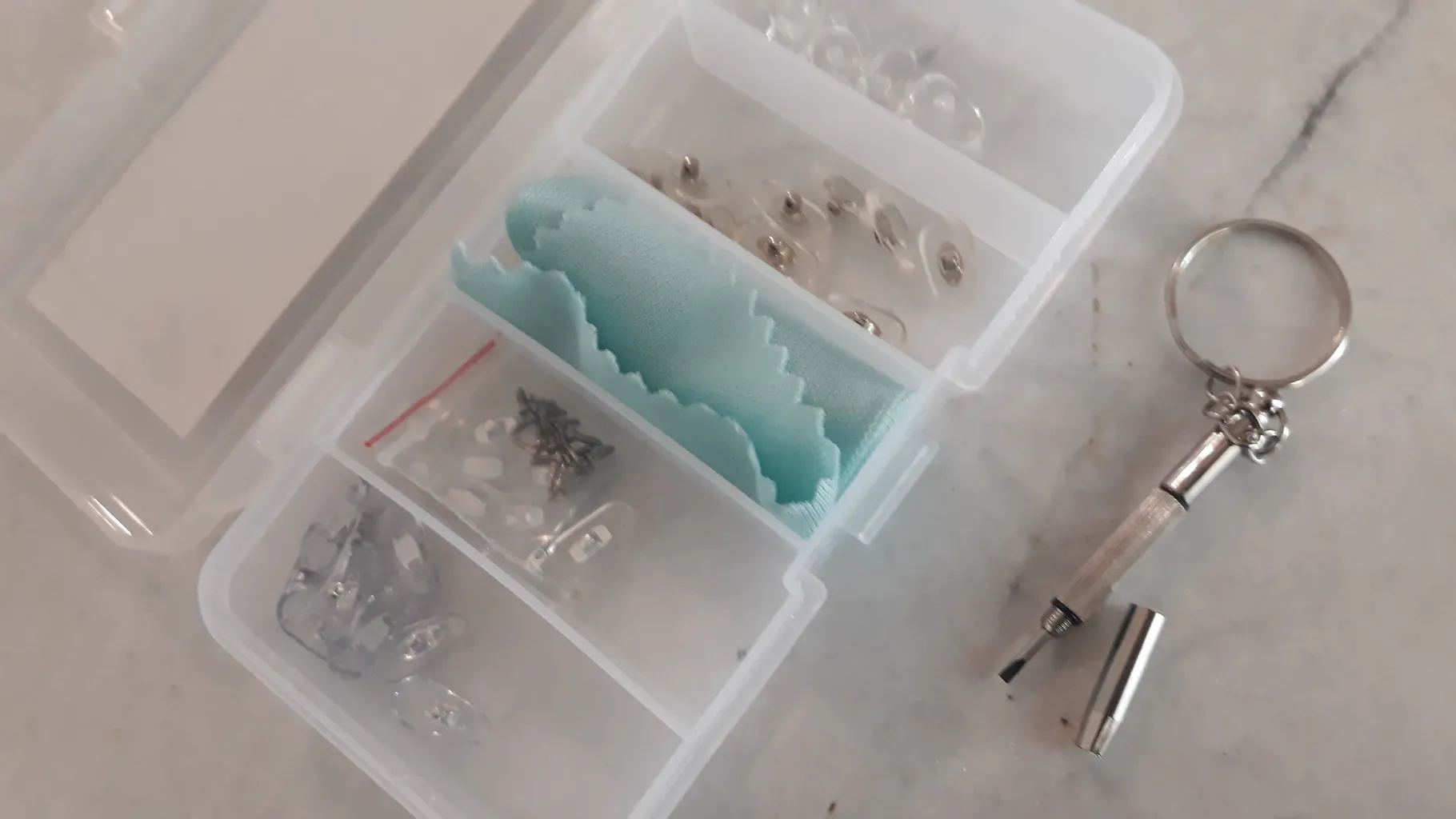 لوازم جانبی تعمیر عینک ارس پویا مدل NPG01 مجموعه 62 عددی