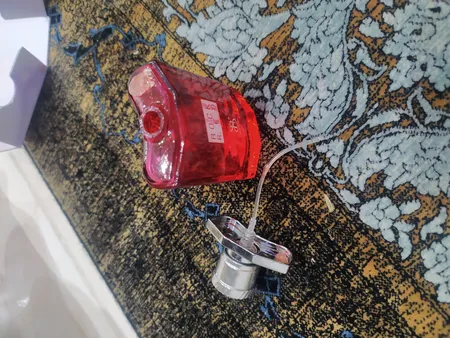 عطر جیبی مردانه برندینی مدل راک رد حجم 25 میلی لیتر