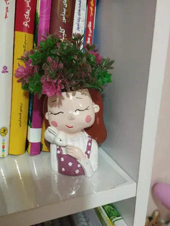 گلدان طرح دختران زمستانی کد Gw01 مجموعه 4 عددی