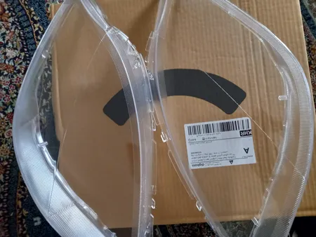 طلق چراغ جلو خودرو مدل فابریک مناسب برای تیبا بسته 2 عددی