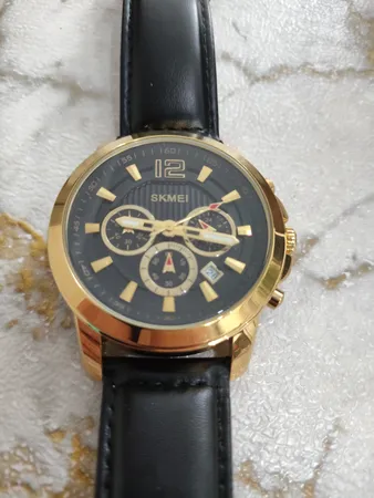 ساعت مچی عقربه‌ای مردانه اسکمی مدل 1989 GDBK