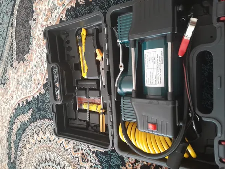 کمپرسور هوا باس مدل فندکی خودرو کد 12-V مجموعه 14 عددی