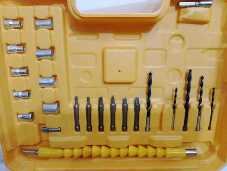 دریل پیچ گوشتی شارژی چکشی نیو پاور مدل 36-2 مجموعه 25 عددی