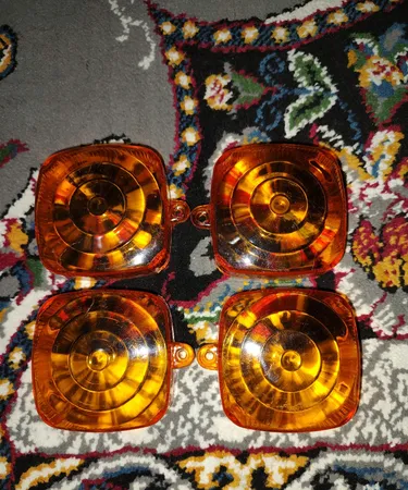 طلق چراغ راهنما موتور سیکلت مدل AMIC-NARJ مناسب برای هندا 125 مجموعه 4 عددی