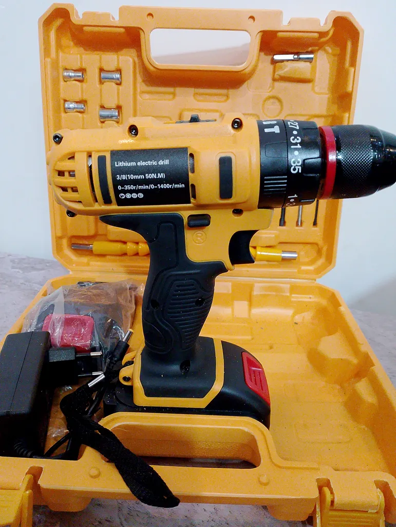 دریل پیچ گوشتی شارژی چکشی نیو پاور مدل 36-2 مجموعه 25 عددی