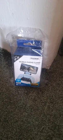 پایه نگهدارنده موبایل و دسته بازی پلی استیشن 5 دابی مدل TP5-0527B