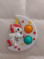 تجریه خرید فیجت ضد استرس دنیای سرگرمی های کمیاب مدل  پاپیت یونی کورن