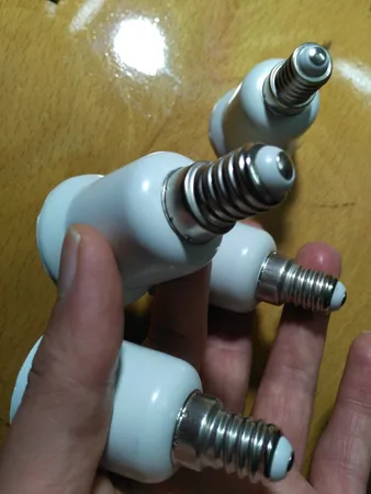 تبدیل سرپیچ لامپ E14 به E27 مدل T2 مجموعه 4 عددی