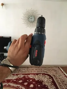 تجریه خرید دریل پیچ گوشتی برقی رابین مدل R1001