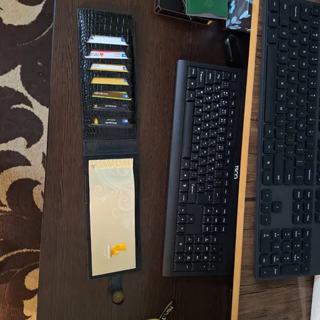 کیف دسته چک چرم عطارد مدل K19