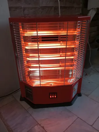 بخاری برقی گرما گستر مهر مدل فن دار
