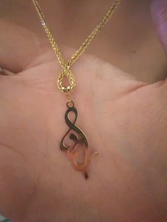 آویز گردنبند طلا 18 عیار زنانه کرابو طرح رضا مدل Kr30069