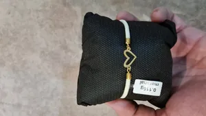 تجریه خرید دستبند طلا عیار 18 زنانه ناریا مدل قلب