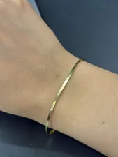 تجریه خرید دستبند طلا 18 عیار زنانه مدل هرینگبون