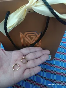 تجریه خرید گوشواره طلا 18 عیار زنانه ماوی گالری مدل کمربندی