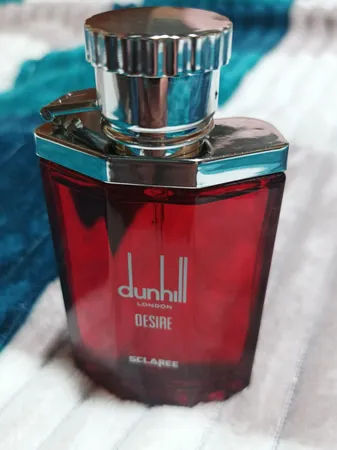 عطر جیبی مردانه اسکلاره مدل Dunhill Desire Red حجم 30 میلی لیتر
