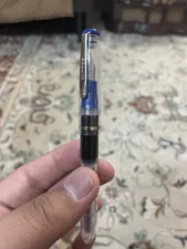 تجریه خرید خودنویس دلار شفاف مدل 717i