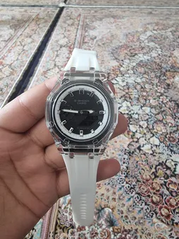 ساعت مچی عقربه ای مدل دو زمانه پمپی قاب شفاف کد w-m