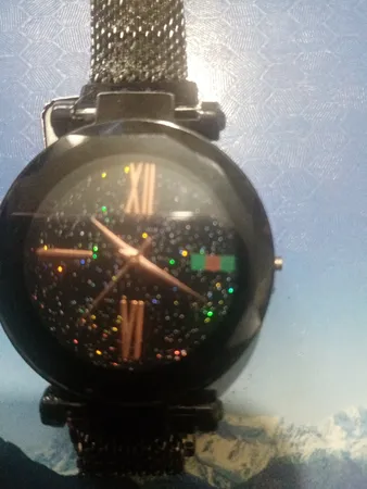 ساعت مچی عقربه ای دخترانه مدل حصیری مگنتی کد 1402