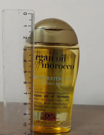 روغن مو او جی ایکس مدل آرگان مراکشی حجم 100 میلی لیتر