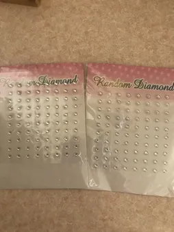 پیرسینگ بینی زنانه مدل چسبی طرح الماس کد nos110 بسته 100 عددی