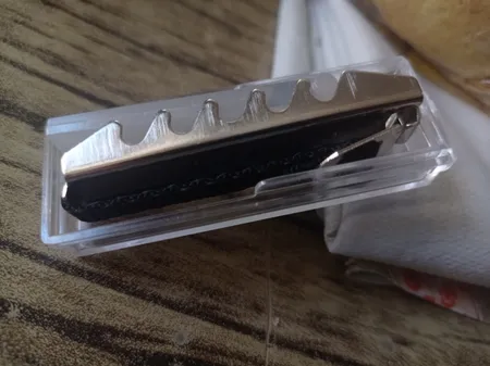 کاپو گیتار مدل بندی کد 7 همراه پیک مجموعه 2 عددی