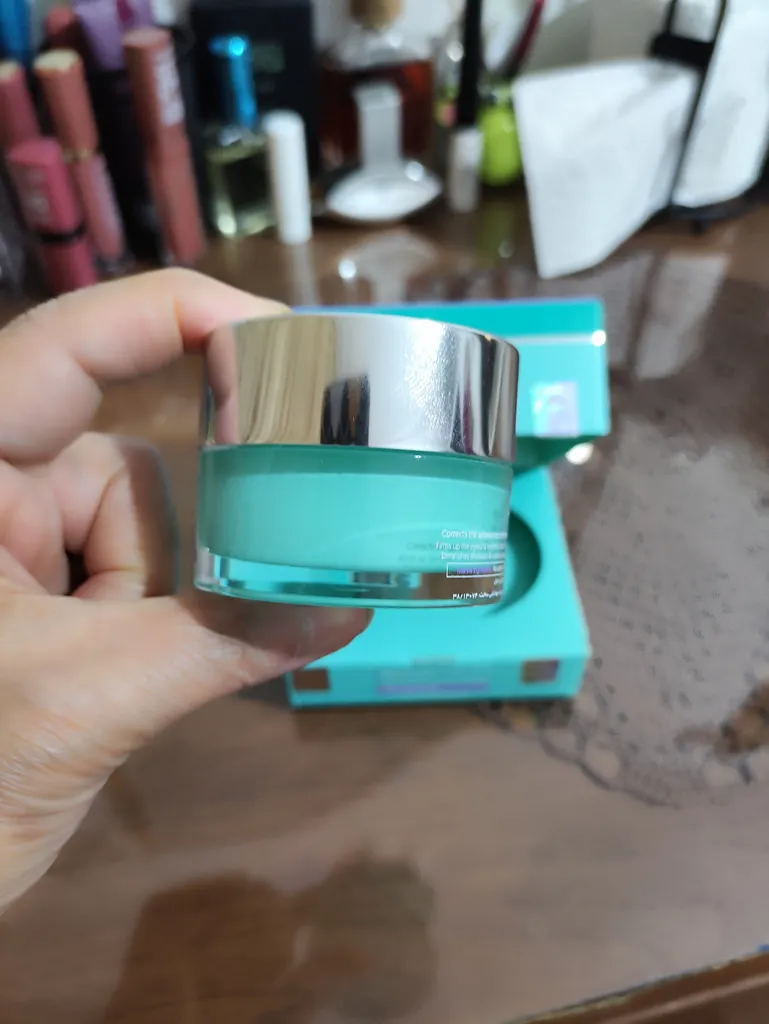 کرم دور چشم بایومارین مدل +AQUA LUCENT 40 حجم 15 میلی لیتر به همراه رولر ماساژ استنلس استیل