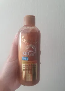 تجریه خرید روغن آفتاب سی گل مدل Shimmer Sun Oil حجم 250 میلی لیتر