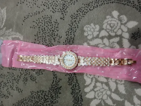 ساعت مچی عقربه ای زنانه مدل دستبندی نگین دار کد 02