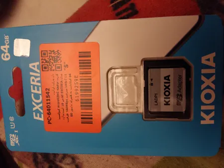 کارت حافظه‌ microSDHC کیوکسیا مدل EXCERIA کلاس 10 استاندارد UHS-I U1 سرعت 100MBps ظرفیت 64 گیگابایت به همراه آداپتور SD