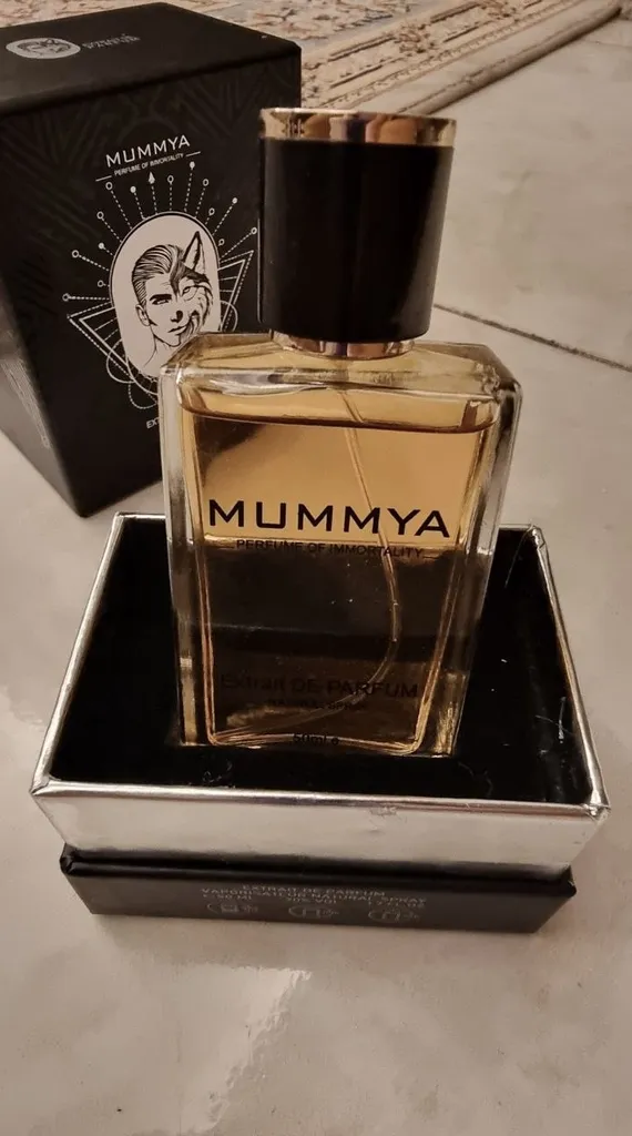 اکستریت پرفیوم مردانه مومیا مدل مارلی لیتون با رایحه گرم حجم 50 میلی لیتر