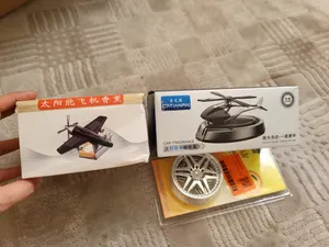 تجریه خرید خوشبو کننده خورشیدی خودرو طرح هواپیما نقره ای ملخی مدل AF1008