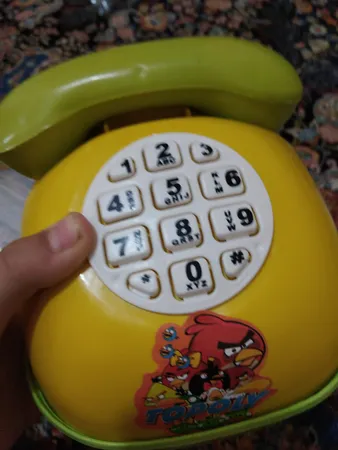 قلک طرح اسباب بازی تلفن و ماشین