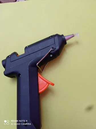 دستگاه چسب تفنگی جانسون مدل FL-138B به همراه یک عدد چسب حرارتی جانسون بصورت رایگان
