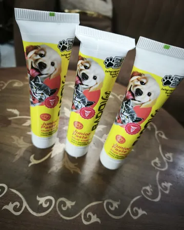 مالت بچه گربه و سگ برند بادو مدل مولتی ویتامین جونیور وزن 100 گرم